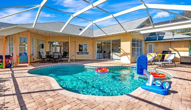 Pool + Game Room | Lanai & Canal View