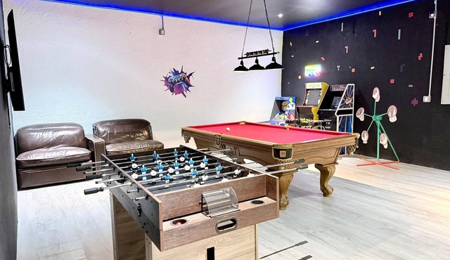 Pool house 4 bedroom 2 bath, Playground, ping pong table, foosball table & more.