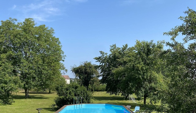 Pool villa in a green setting
