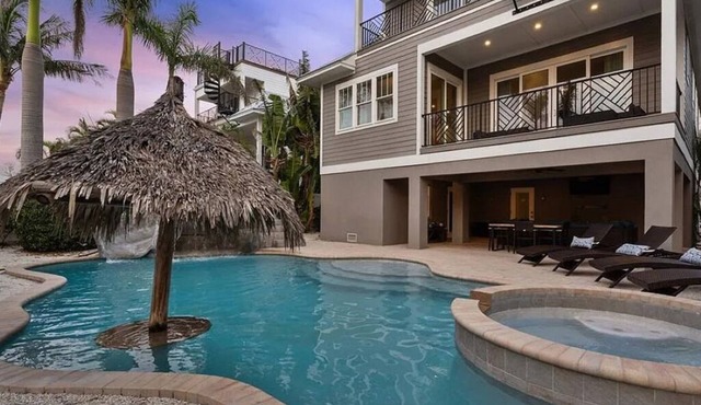 Pool with with water slide & grotto! Sleeps 14! Walk to Beach!