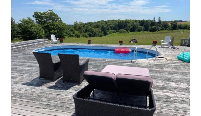 POOLSIDE ESCAPE in the heart of PEI . We are central to everything!