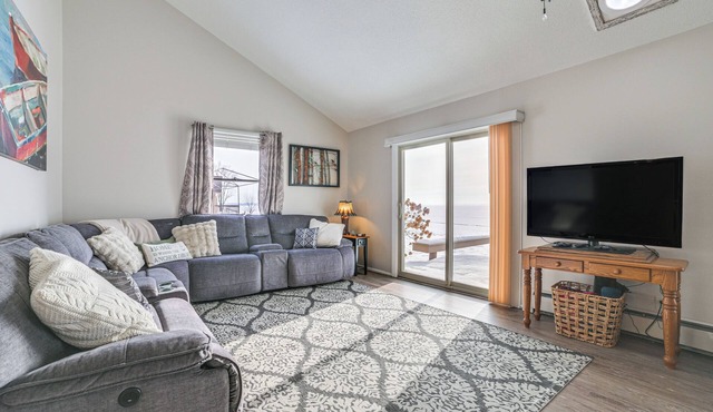 Porch + Views: Waterfront Home on Houghton Lake!