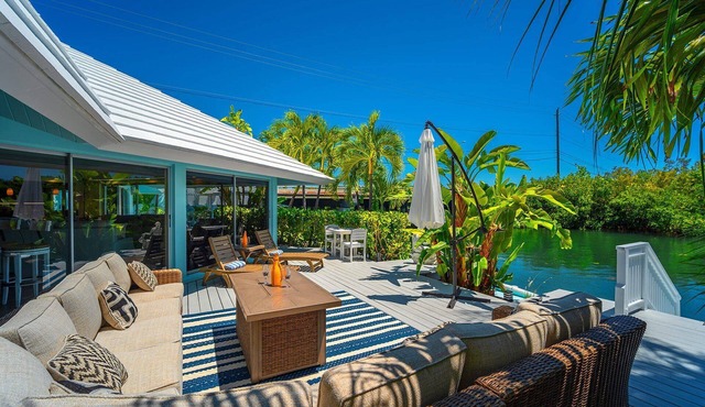 Poseidon's Paradise: Luxury Waterfront Rental in Key West, Stunning Backyard Oasis and Private Pool!