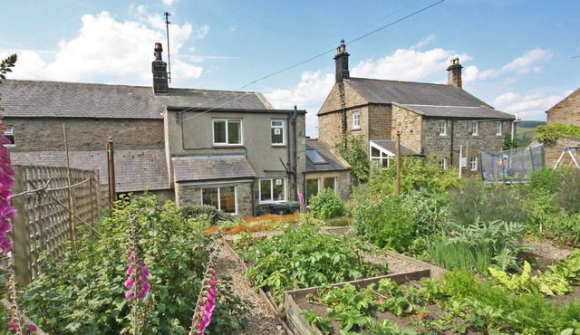 Pretty stone cottage in the picturesque village of Greenhaugh only 4. 5 miles from Bellingham .