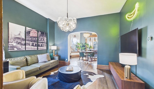 Premier 4BR Art Deco suite with garage.