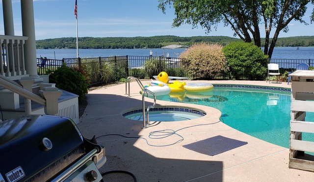 Premier Home on Chautauqua Lake with beautiful covered deck, pool and dock.
