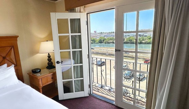 Premier Riverfront Retreat with Hot Tub, Grill & Steps to Historic Downtown