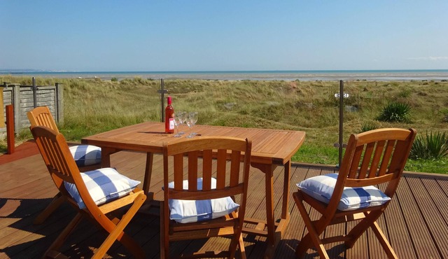 Premier spacious house. Sleeps 10. Direct Access to beach. Superb sea views.