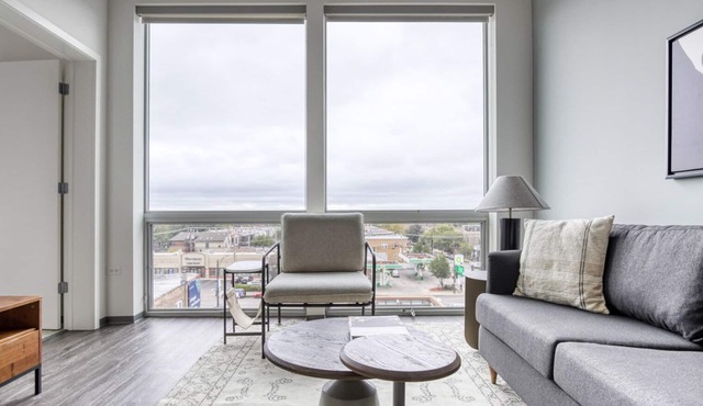 Premium Logan Square 1BR w/Roof Deck & Gym, 1 block to L, by Blueground