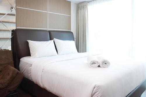 Premium Studio Room @ Tamansari La Grande Apartment By Travelio