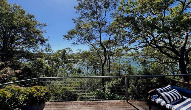 Pretty Beach Escape by HolidayCo.