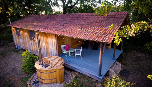 Pretty cabin in beautiful gardens with wood stove & Nordic spa hot-tub/jacuzzi.