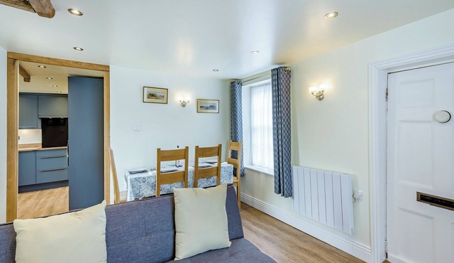 Pretty cottage with lovely views over open countryside close to the coast.