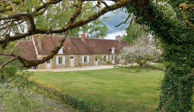 Pretty farmhouse on the edge of a village