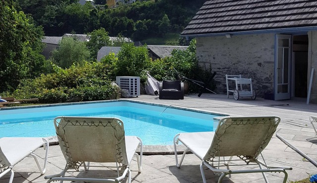Pretty house with swimming pool in wooded grounds overlooking the Pic du Montaigu.