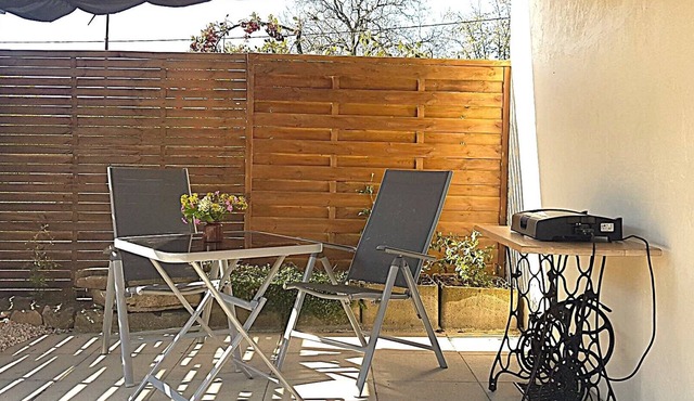 Pretty studio on the farm with covered seating area