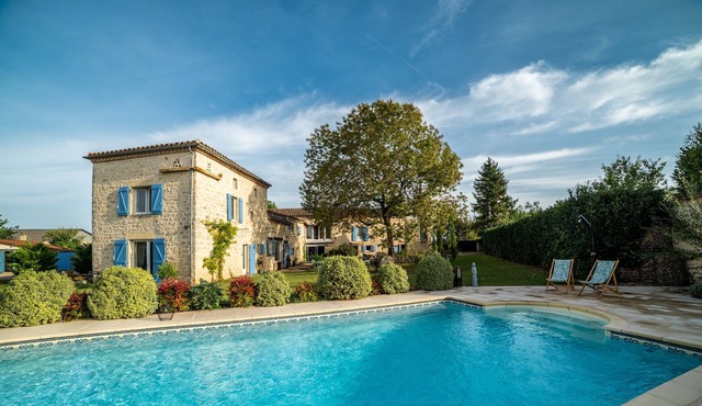 Pretty stone cottage with terrace in a property with swimming pool