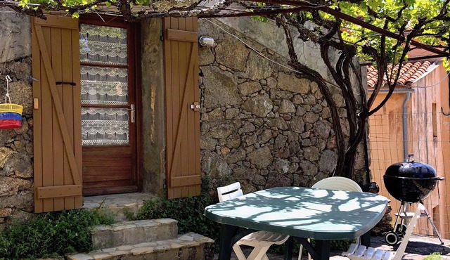 pretty stone house in the heart of the village
