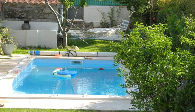 Pretty village house with private heated pool and a/c. Opposite historic church.