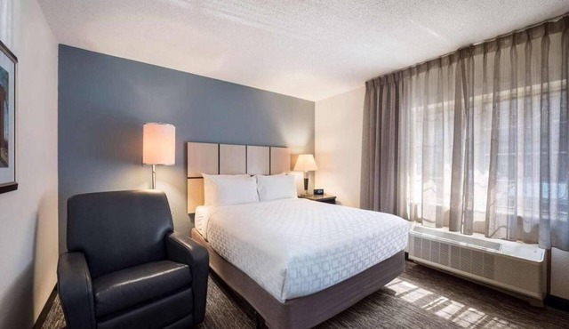 Prime Location! TWO Spacious 1BR Suites with Kitchens, Free Airport Shuttle!