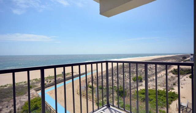 Pristine, bright 1 bedroom oceanfront condo with free WiFi, coastal decor, and a gorgeous view of the ocean located in quiet midtown and only a few steps from the beach!