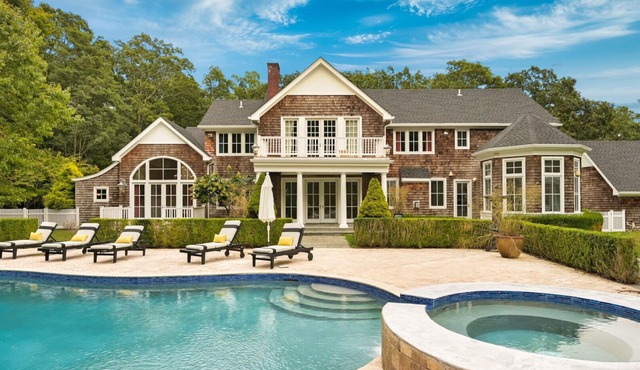 Pristine estate sited on 4 acres of land, 1,700 SF pool pavilion with.