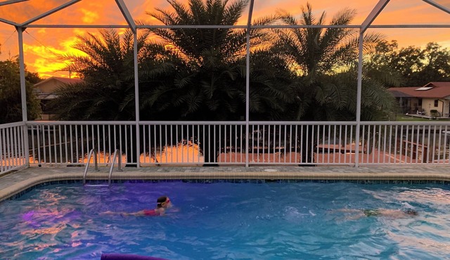 PRISTINE WATERFRONT HOME WITH DESIGNER FINISHES & HEATED SWIMMING POOL