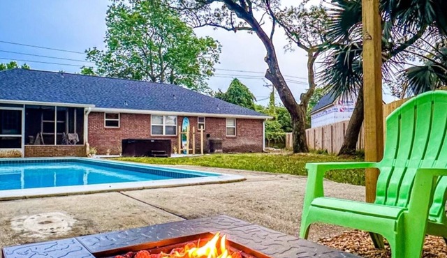 Private 4 bedroom house near the beach with pool, hot tub, fire pit, game room.