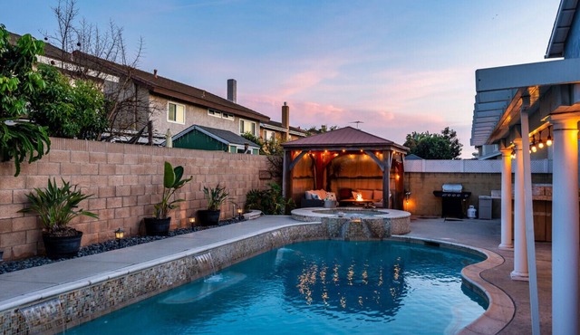 Private 4-bedroom pool home with 2 primary suites with heated pool, jacuzzi, fire pit, and outdoor dining. Minutes to Disneyland, Knott’s, and Orange County beaches.