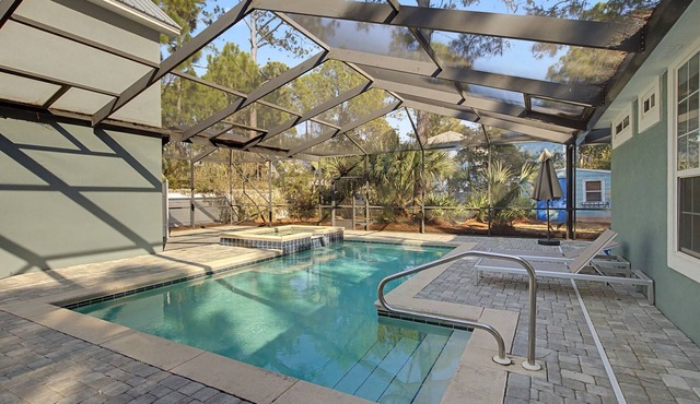 Private 5-bedroom house with private screened in pool and beach access