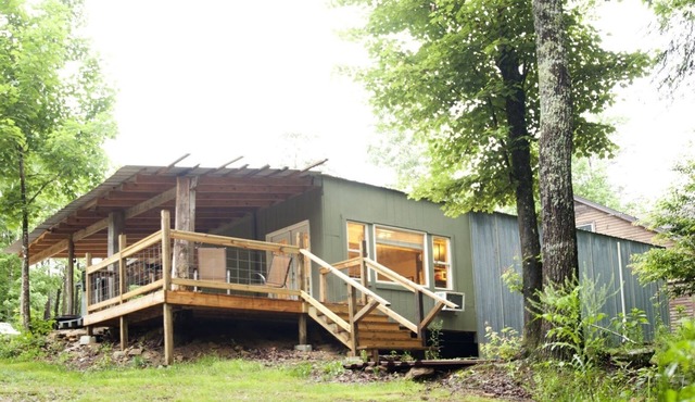 Private 50 ft waterfall. Eco-friendly, cozy shipping container cabin