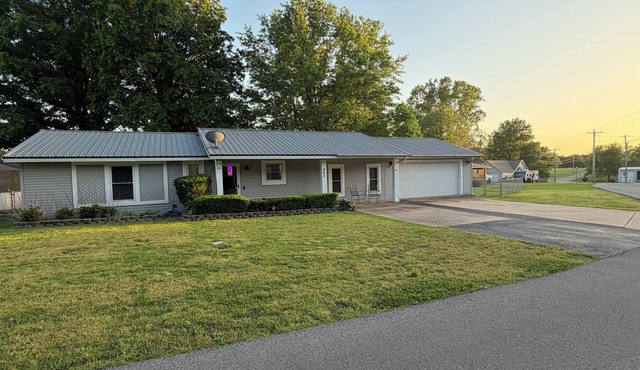 Private access to Grand Lake, Firepit, Huge Yard all included with this home!