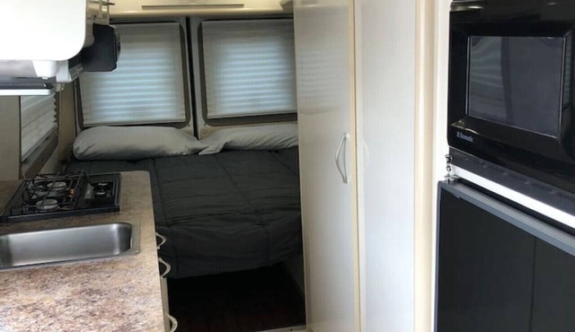 Private and cozy RV with full hookups in a convenient area with direct bus to NYC Manhattan only 2 blocks away