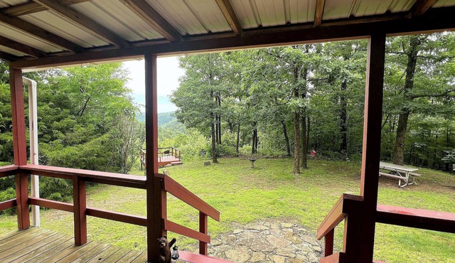 Private and secluded mountain cabin with Ozark views from porch!