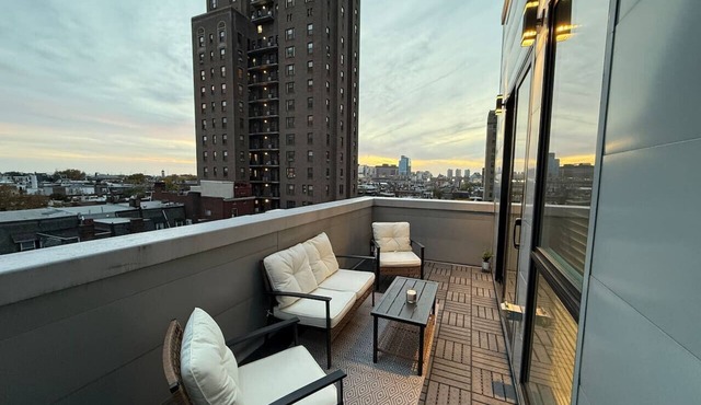 Private Balcony | Gorgeous Center City Bilevel Apt