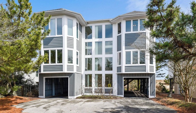 PRIVATE BEACH GATED COMMUNITY! Exceptional OCEAN FRONT beach home is brimming with casual elegance and just perfect for families vacationing together!