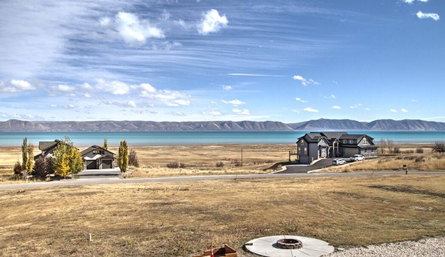 Private beach, pools/hot tub, winter sports, sleeps 20