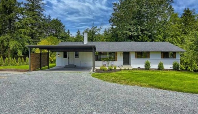 Private, beautifully updated rambler on 1/2 acre