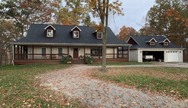 Private brick home in the woods near lake