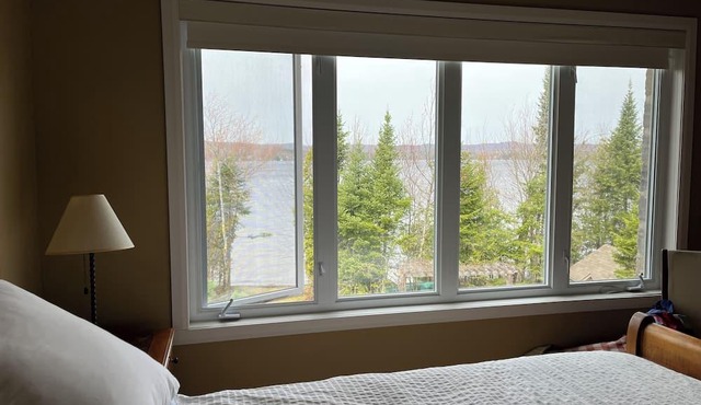 Private magnificent 1-acre lakefront cottage on Lac Brompton. Stand up desk.