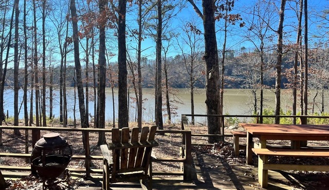 Private cabin on 300 ft of lake shoreline. Hike, fish, and read in seclusion.