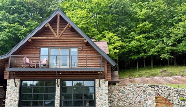 Private Cabin with Lake Views Near Torch Lake, Fire Pit & Boat Parking