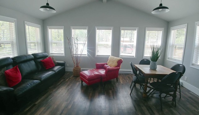 Private cottage with guest cabin, RV Hookup, and hot tub near Whitemouth Lake
