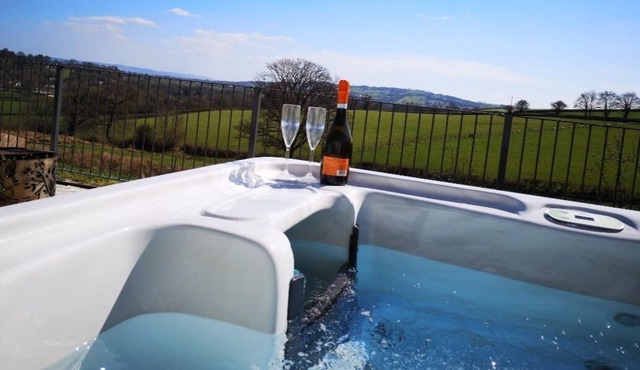 Private covered hot tub and beautiful views