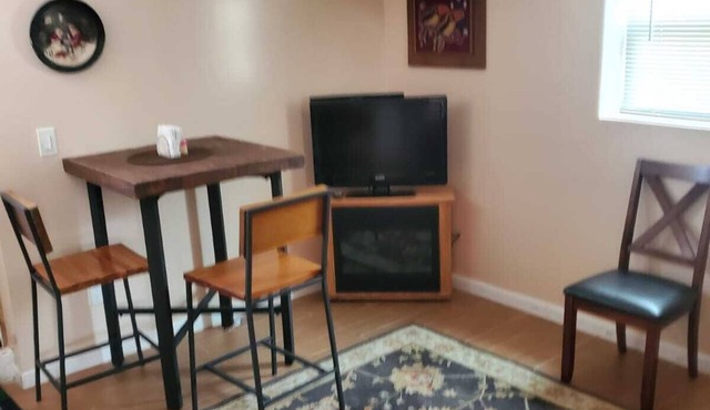 Private entrance to this cozy first floor apartment in house. Close to transit