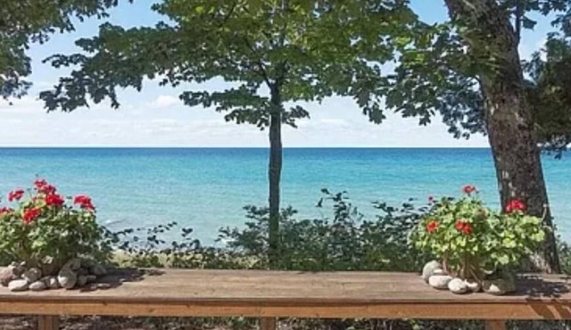 Private family compound on Lake Michigan, near Harbor Springs. Sleeps 12-14