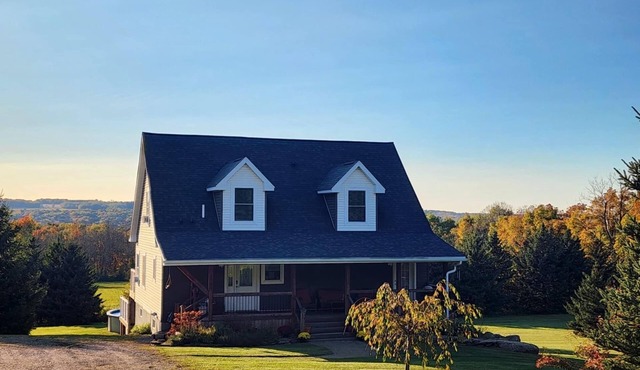 Private Finger Lakes Getaway with a Pool, Hot Tub, and Sauna, timber frame porch