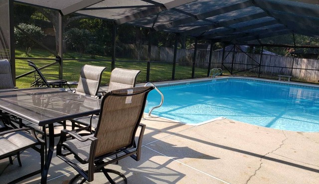 Private Getaway with Screened Pool, Upscale Kitchen, & Large Private Fenced Yard
