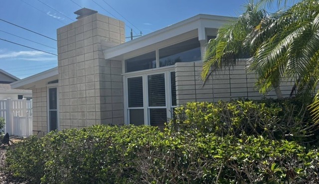 Private Golden Beach access for this Mid-Century Modern Home