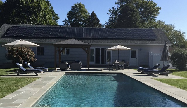 Private heated pool and spacious yard. 5 minute walk to the beach.